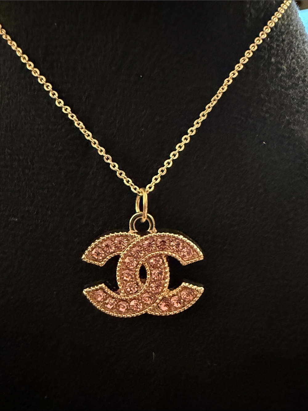 Gold-Tone Interlocking Logo Necklace with Pink Crystals